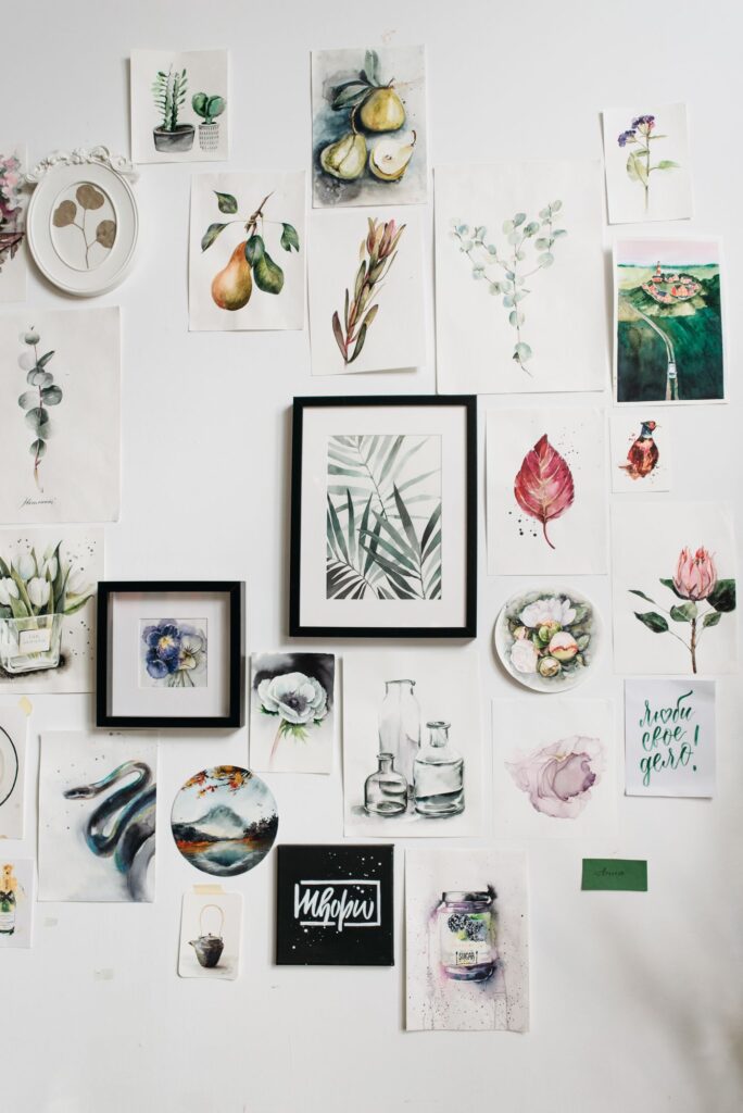 Gallery wall decorated with framed prints and watercolor art
