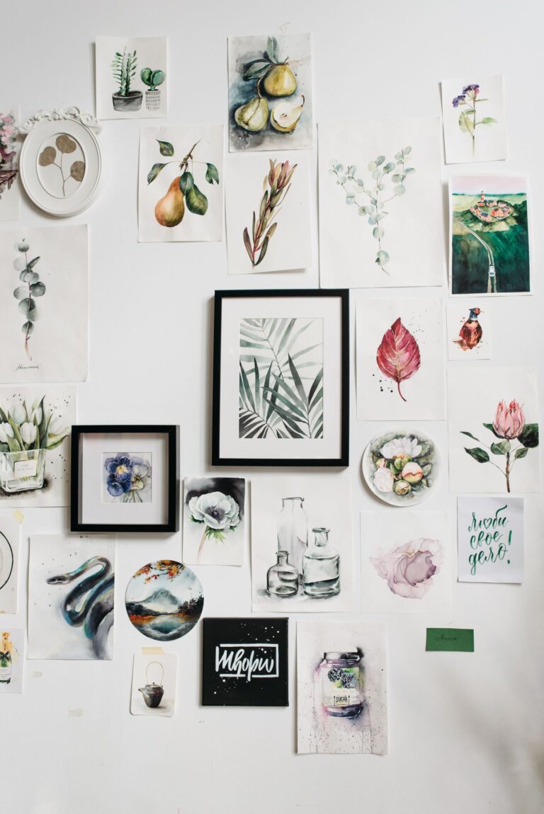 Gallery wall decorated with framed prints and watercolor art